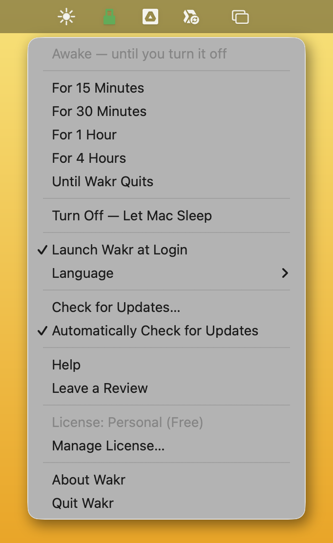The Wakr sun icon in the menu bar with its dropdown open: Awake — until you turn it off, duration options for 15 Minutes, 30 Minutes, 1 Hour, 4 Hours, and Until Wakr Quits, a Turn Off — Let Mac Sleep option, Launch Wakr at Login checked, a Language submenu, Check for Updates, Help and Leave a Review, the license shown as Personal (Free), and About Wakr / Quit Wakr